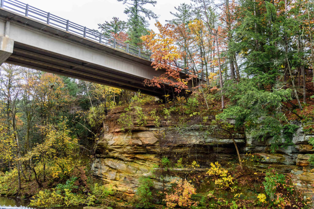 Bridge over sandstone rock cliffs in Wisconsin Dells area